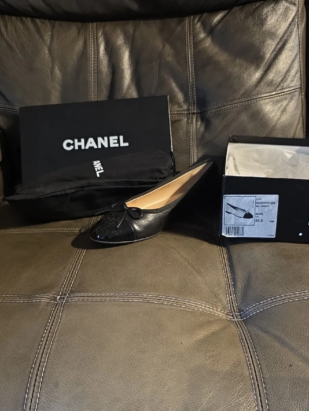 CHANEL Black Leather Quilted Cap-Toe Ballet Flat with Bow